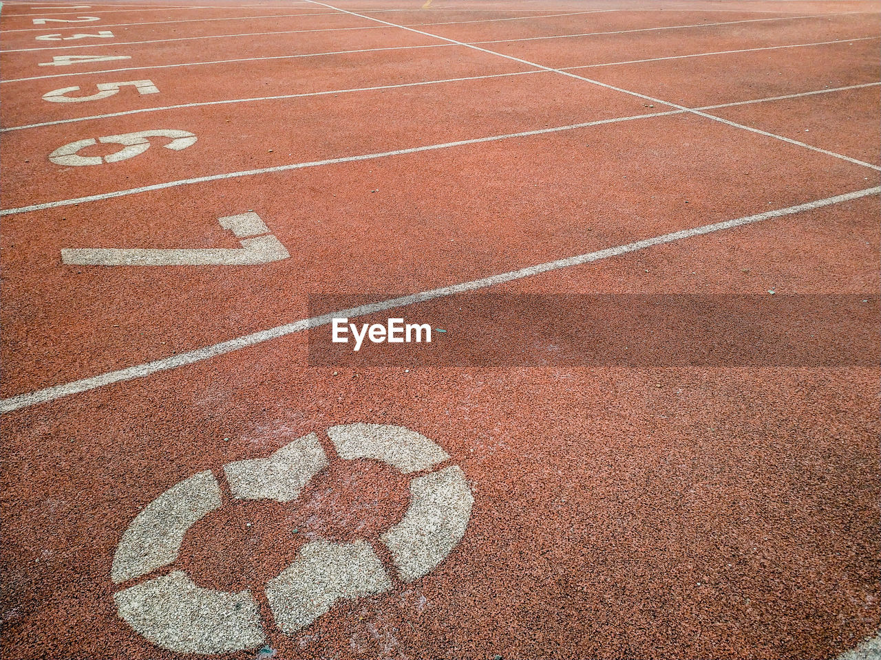 High angle view of numbers on running track in stadium