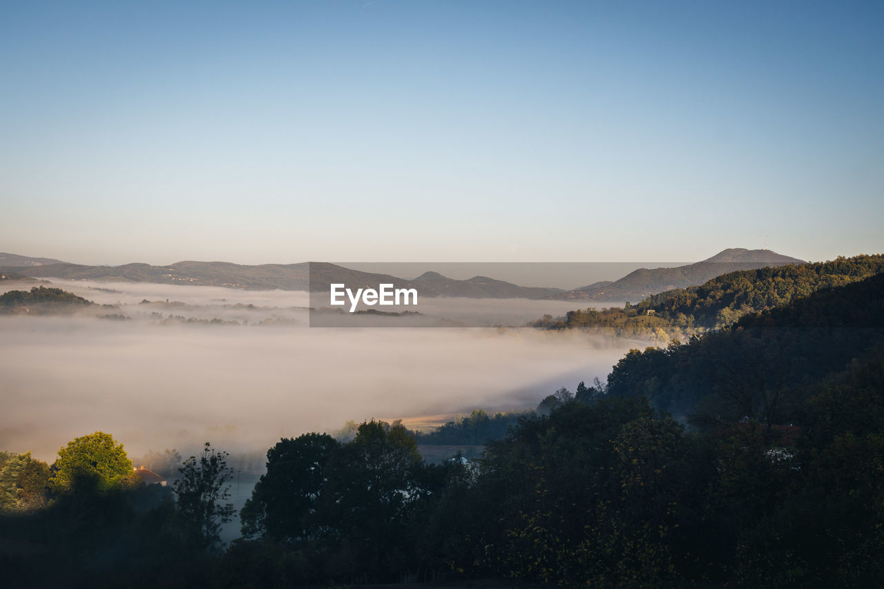 Scenic view of mountains against clear sky