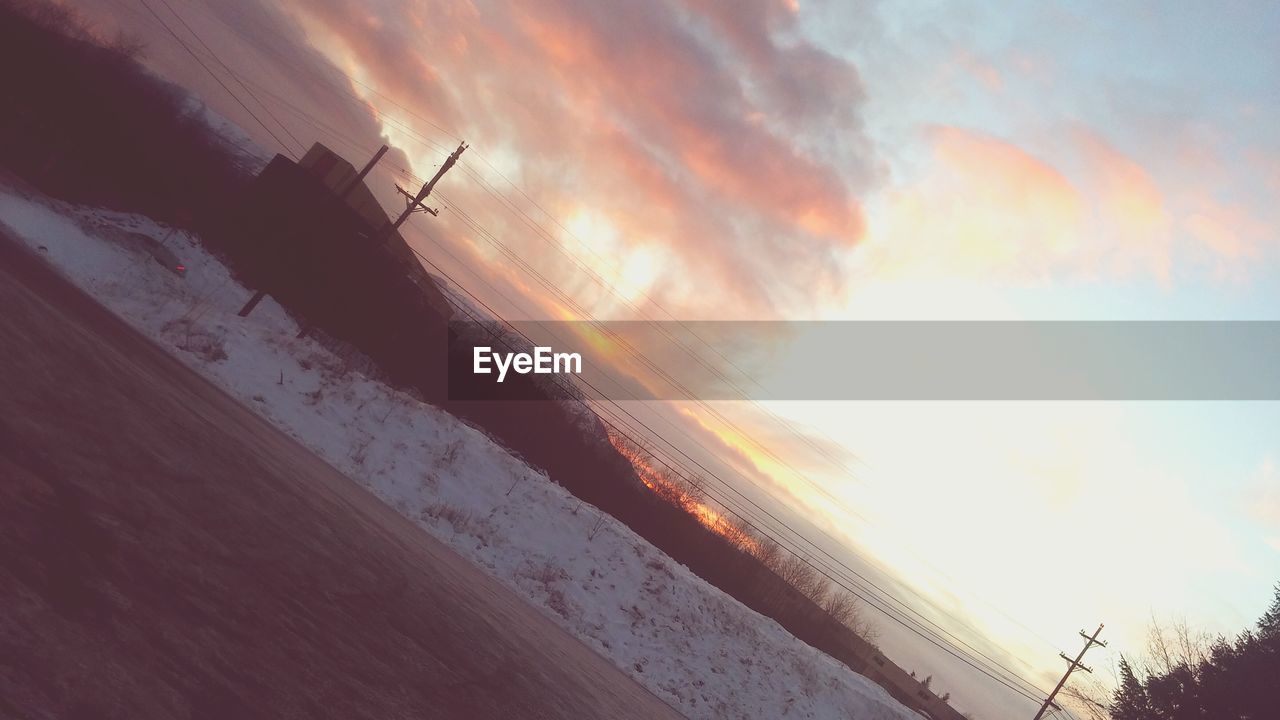 Tilt image of cloudy sky during winter