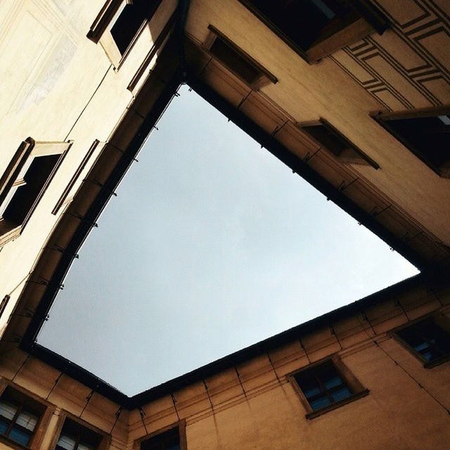 LOW ANGLE VIEW OF BUILDINGS AGAINST SKY