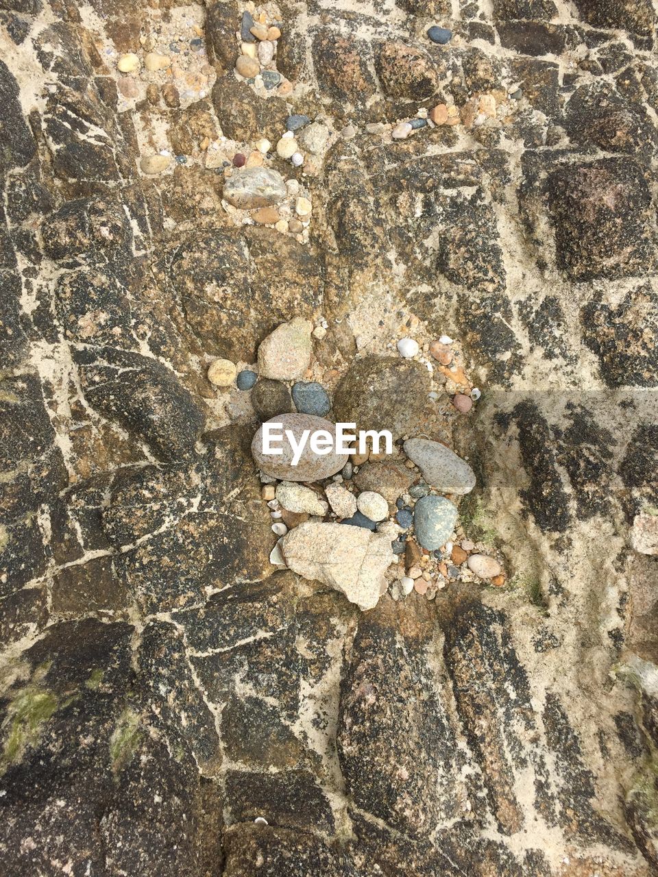 Full frame shot of rock with small stones