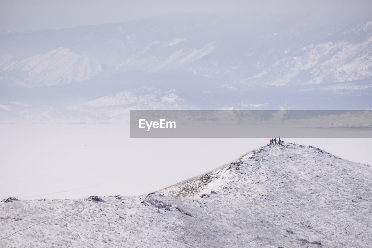 SNOWCAPPED MOUNTAIN AGAINST SKY