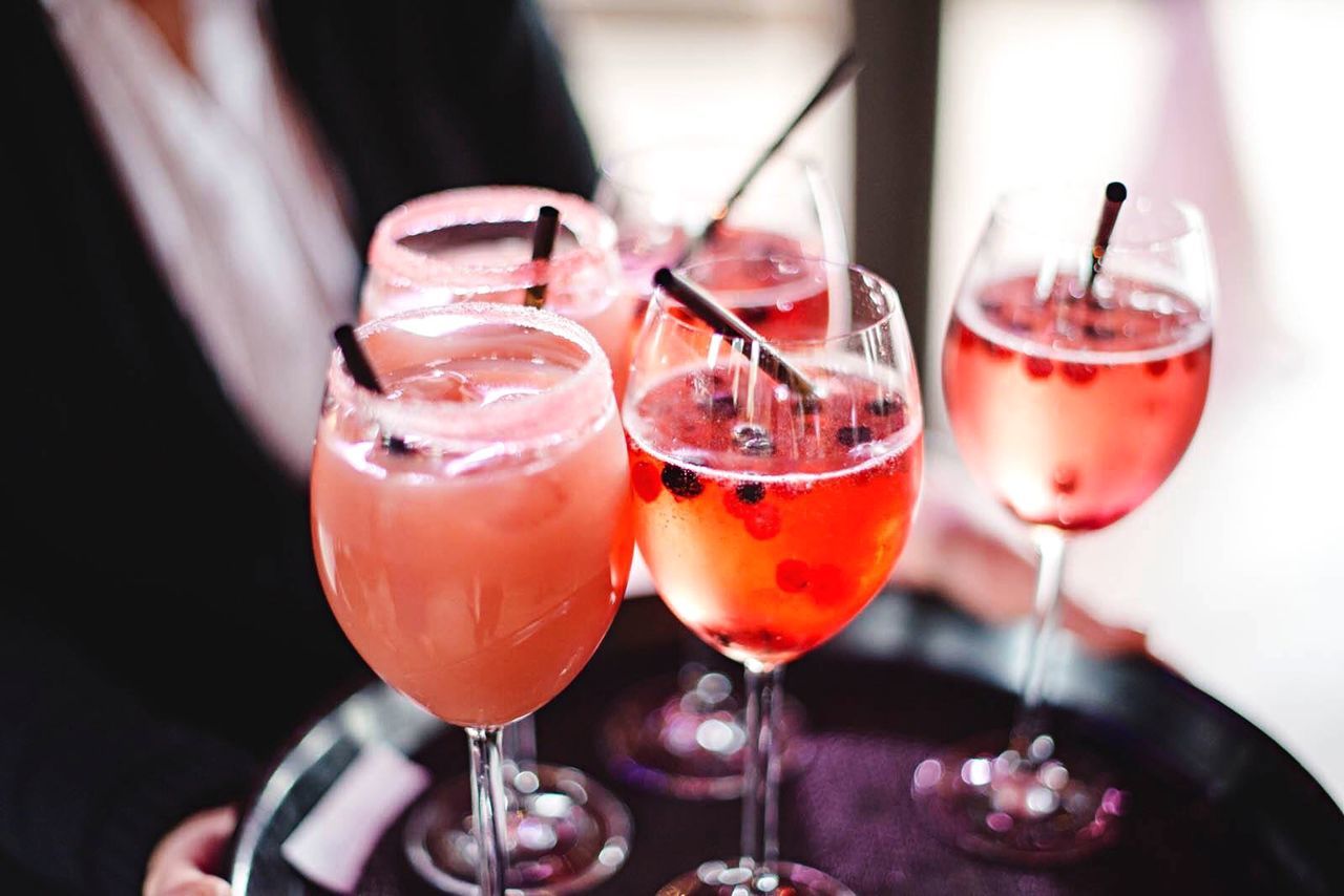 CLOSE-UP OF RED WINE ON TABLE