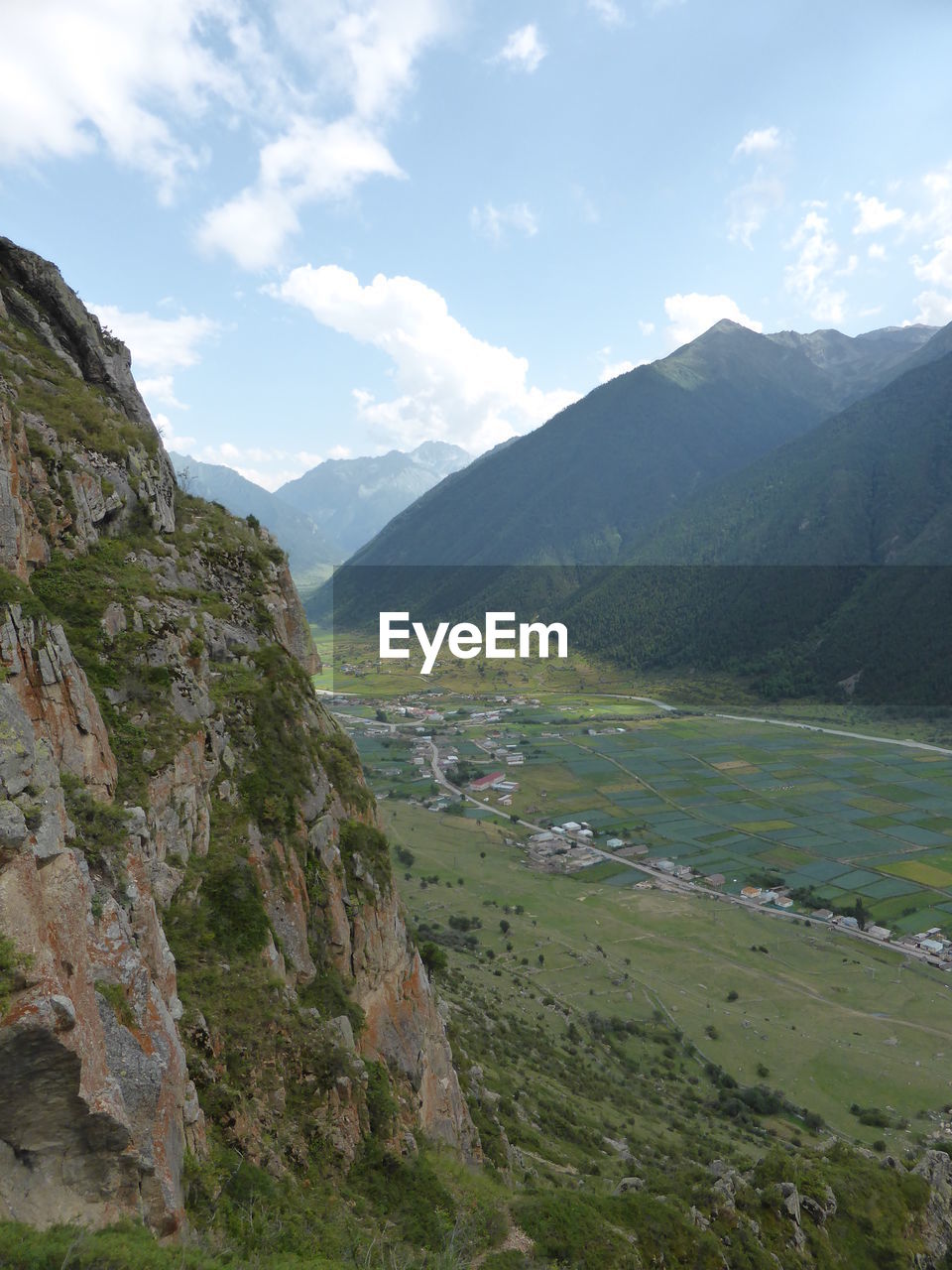 SCENIC VIEW OF MOUNTAINS AND VALLEY