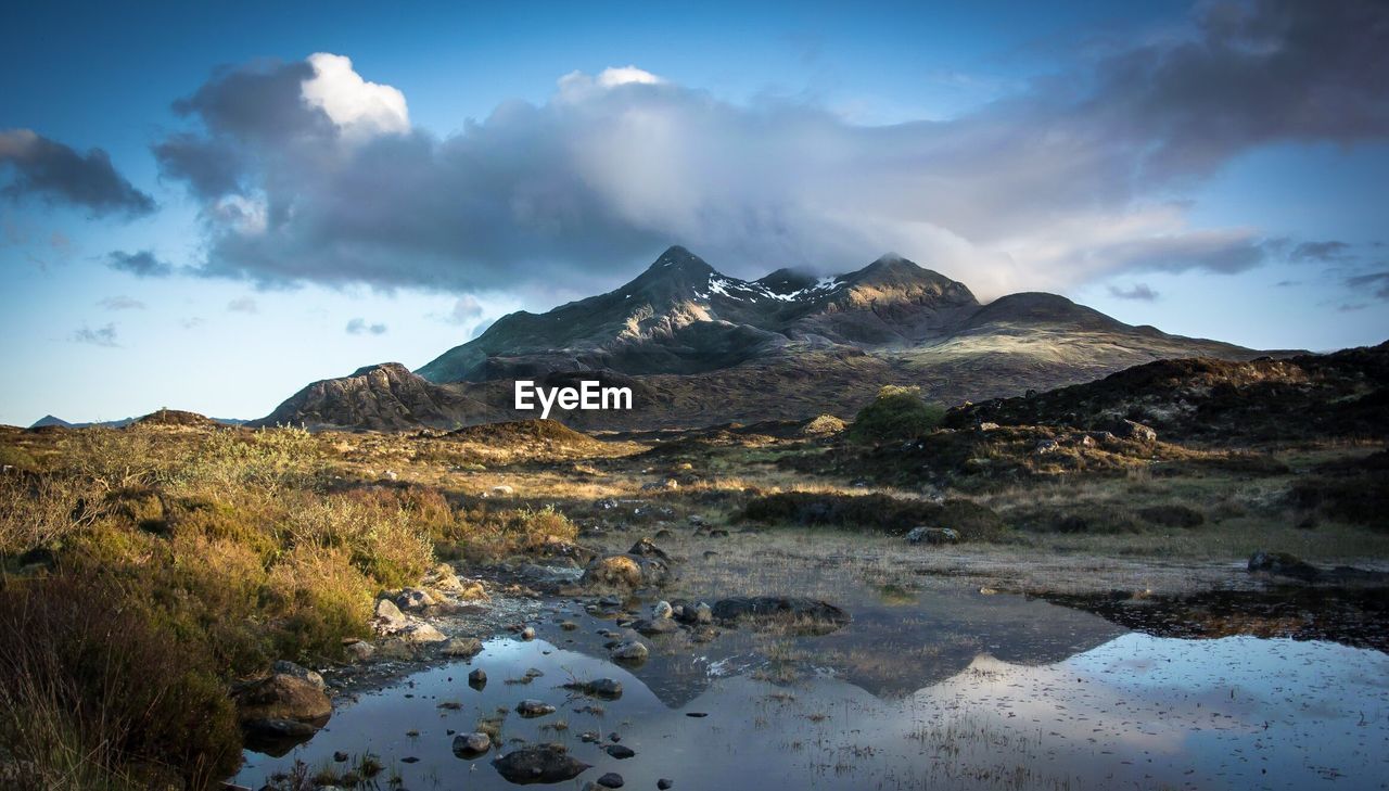 Scenic view of mountain against sky at isle of skye