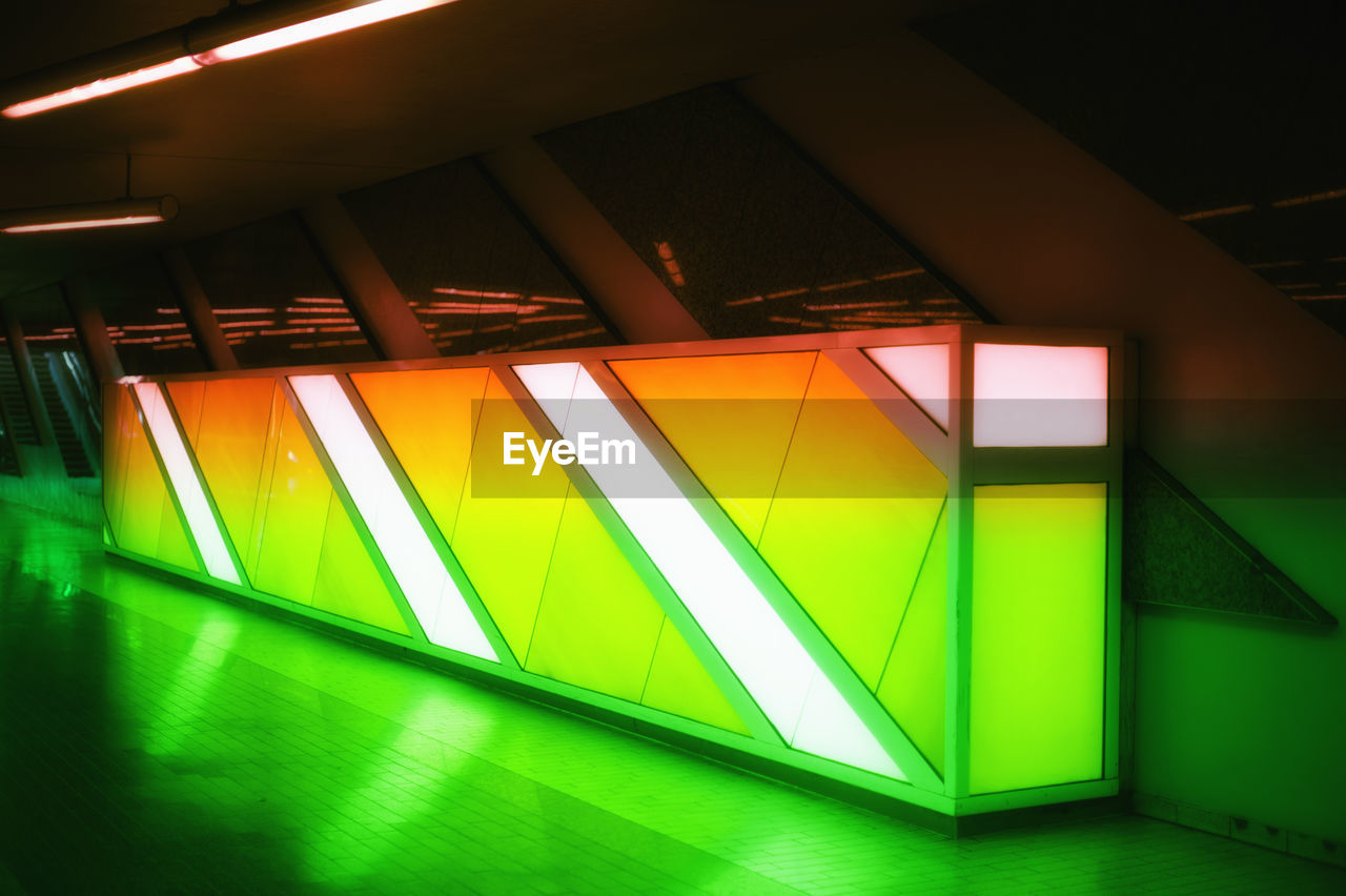 light, green, yellow, architecture, illuminated, lighting, built structure, indoors, no people, multi colored, lighting equipment, neon, night, light - natural phenomenon, wall - building feature, building
