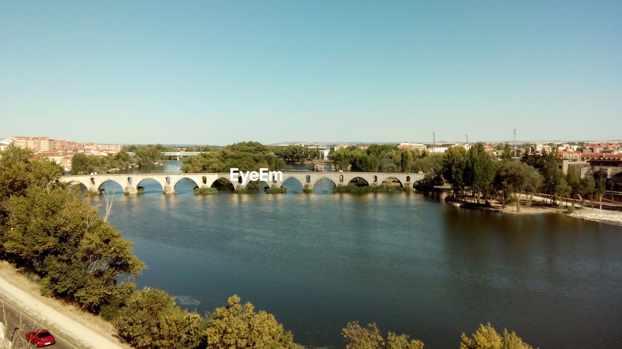 Panoramic shot of cityscape against clear sky