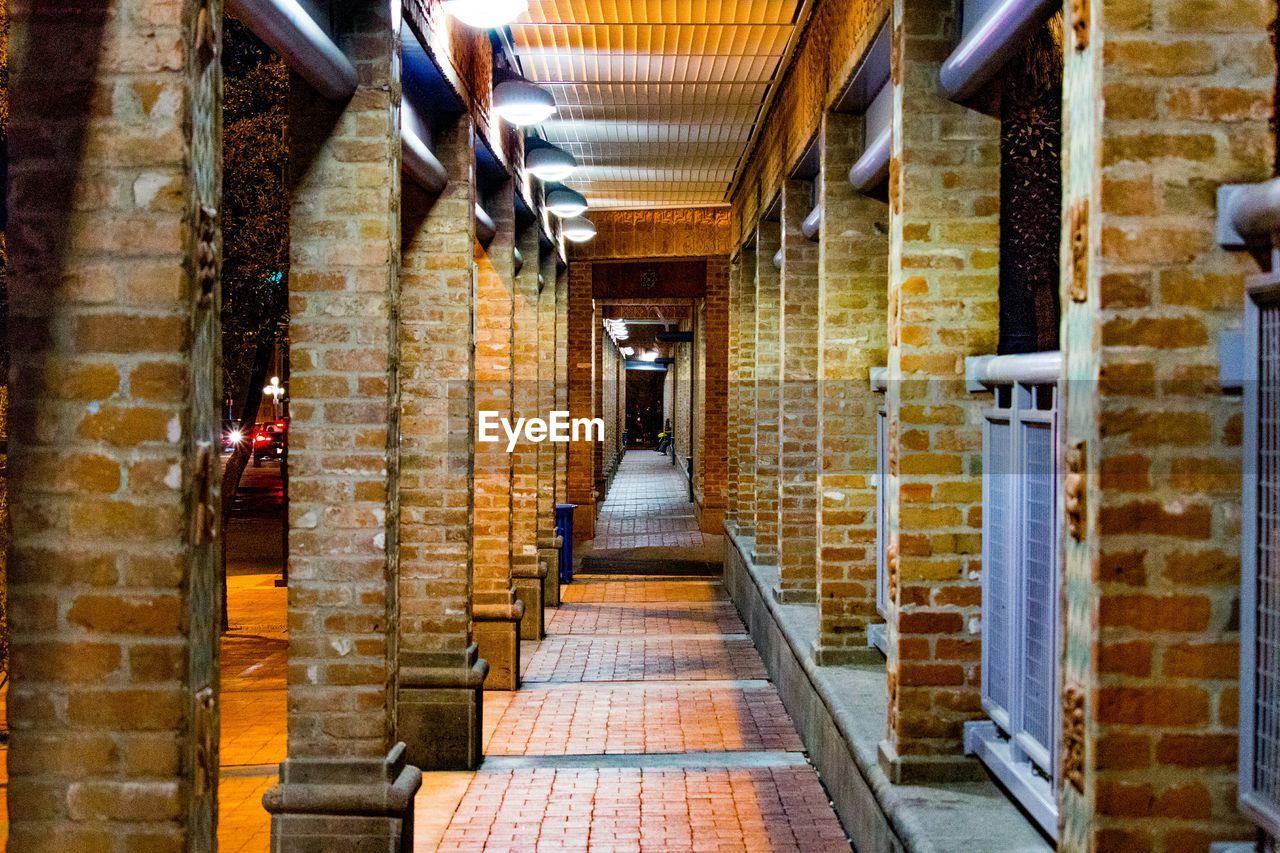 Illuminated colonnade in building