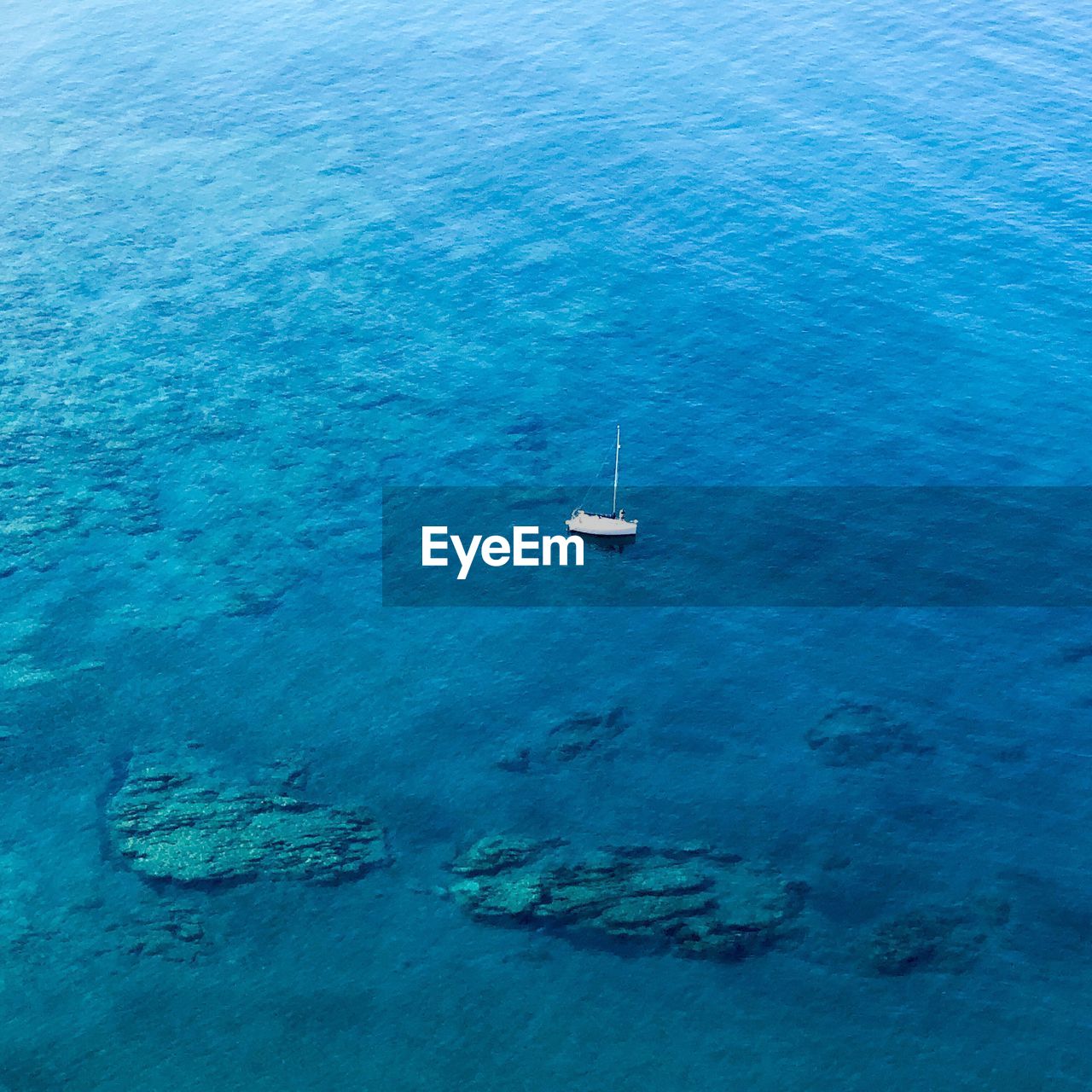 High angle view of sailboat on sea