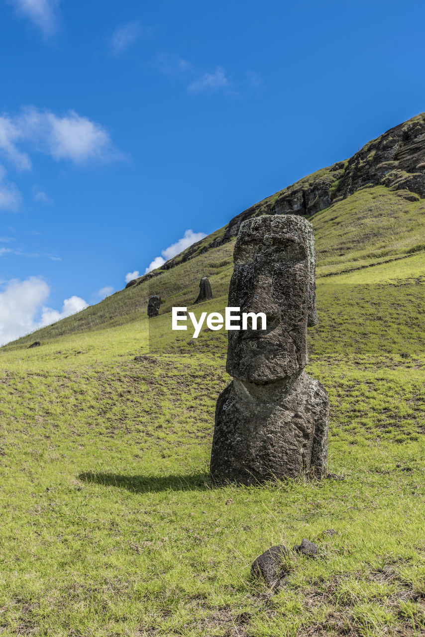 STONE STRUCTURE ON LAND AGAINST SKY