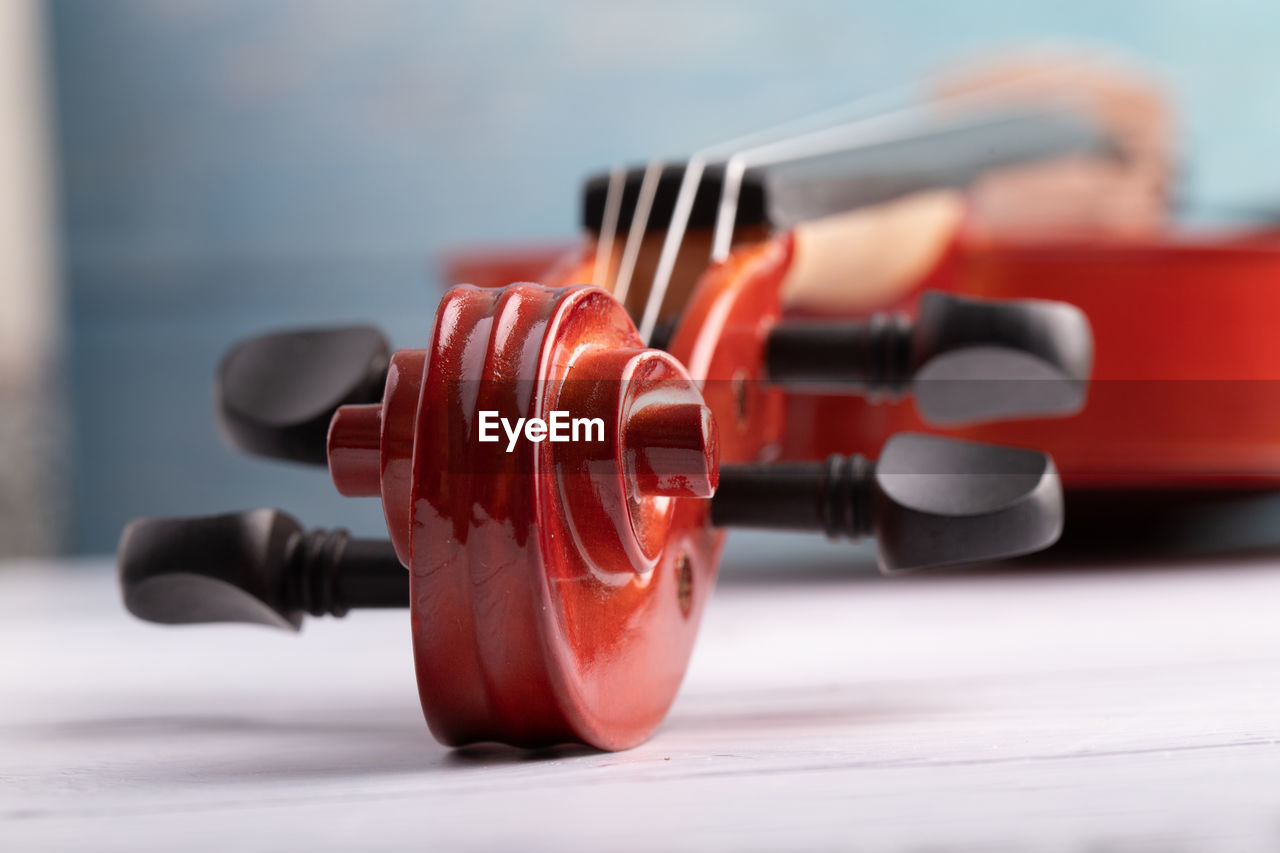 Close-up of violin on table