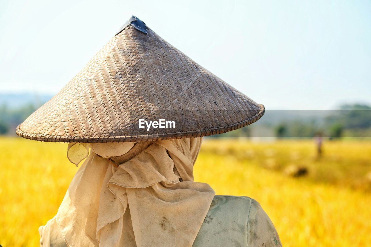 Rear view of woman wearing hat