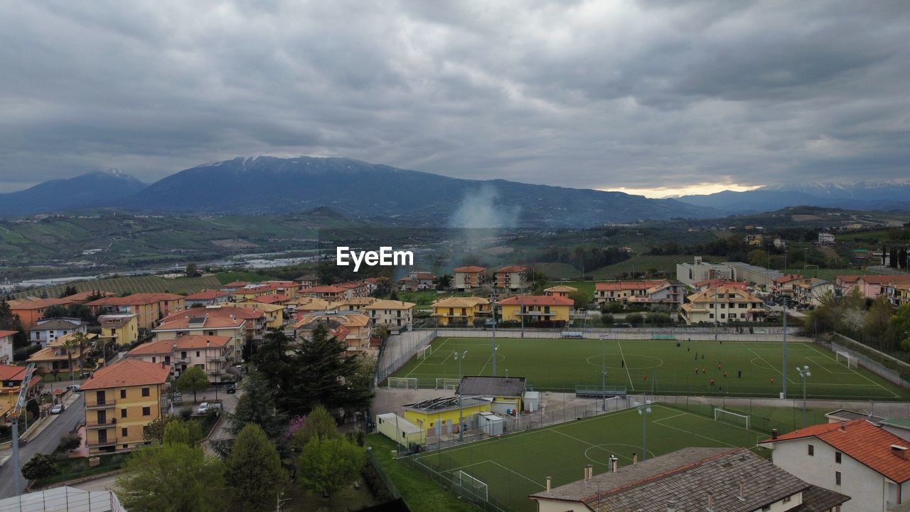 Football field at the foot of the mountain 