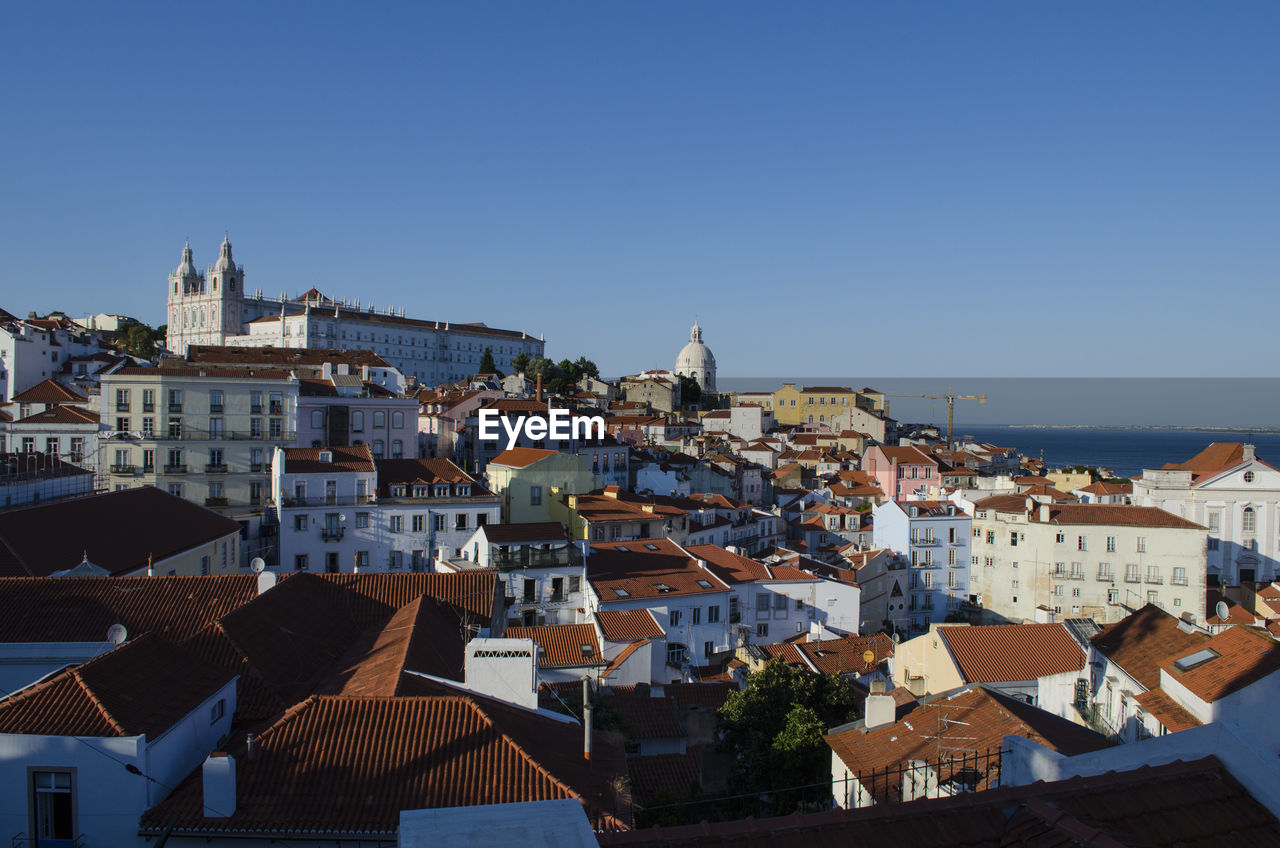 Town against clear sky