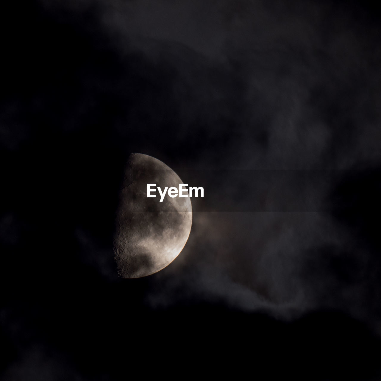 Low angle view of moon against sky at night