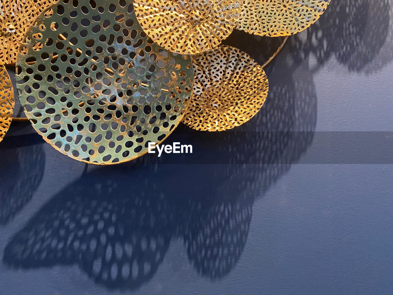 HIGH ANGLE VIEW OF DECORATIONS HANGING ON TABLE