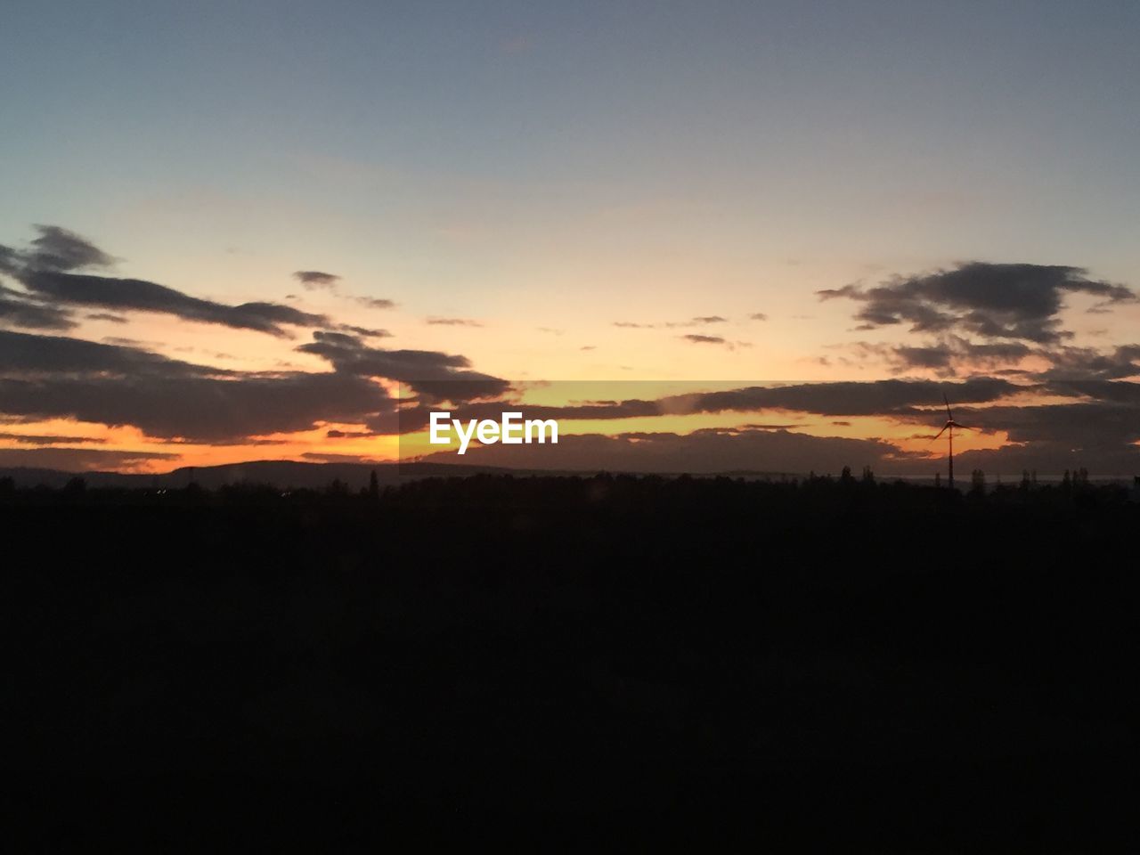 SILHOUETTE LANDSCAPE AGAINST SKY DURING SUNSET