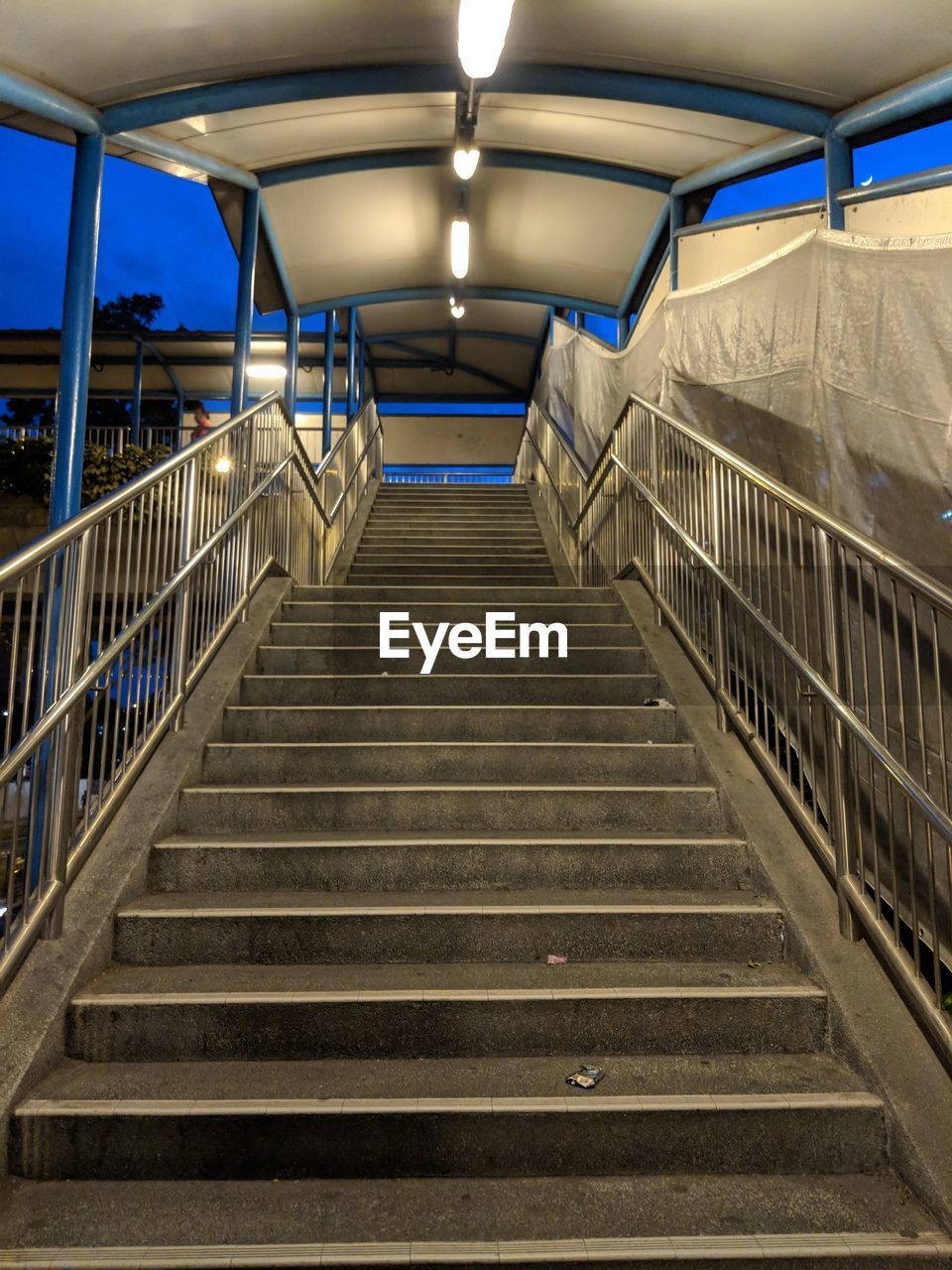 Interior of illuminated subway station