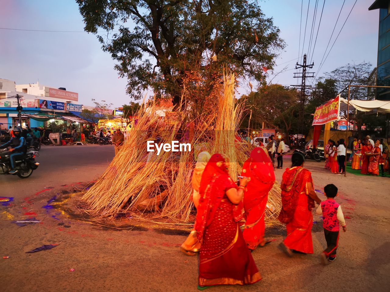 PEOPLE ON STREET IN CITY