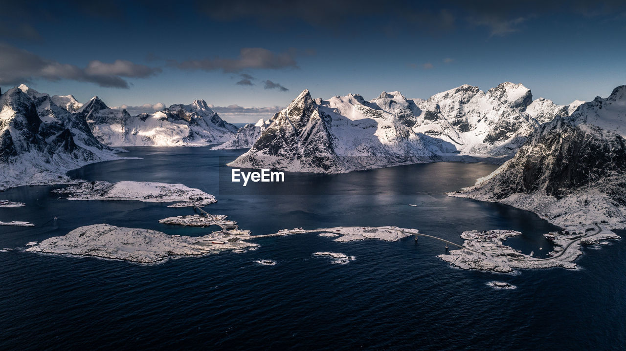 SCENIC VIEW OF SNOWCAPPED MOUNTAIN AGAINST SKY