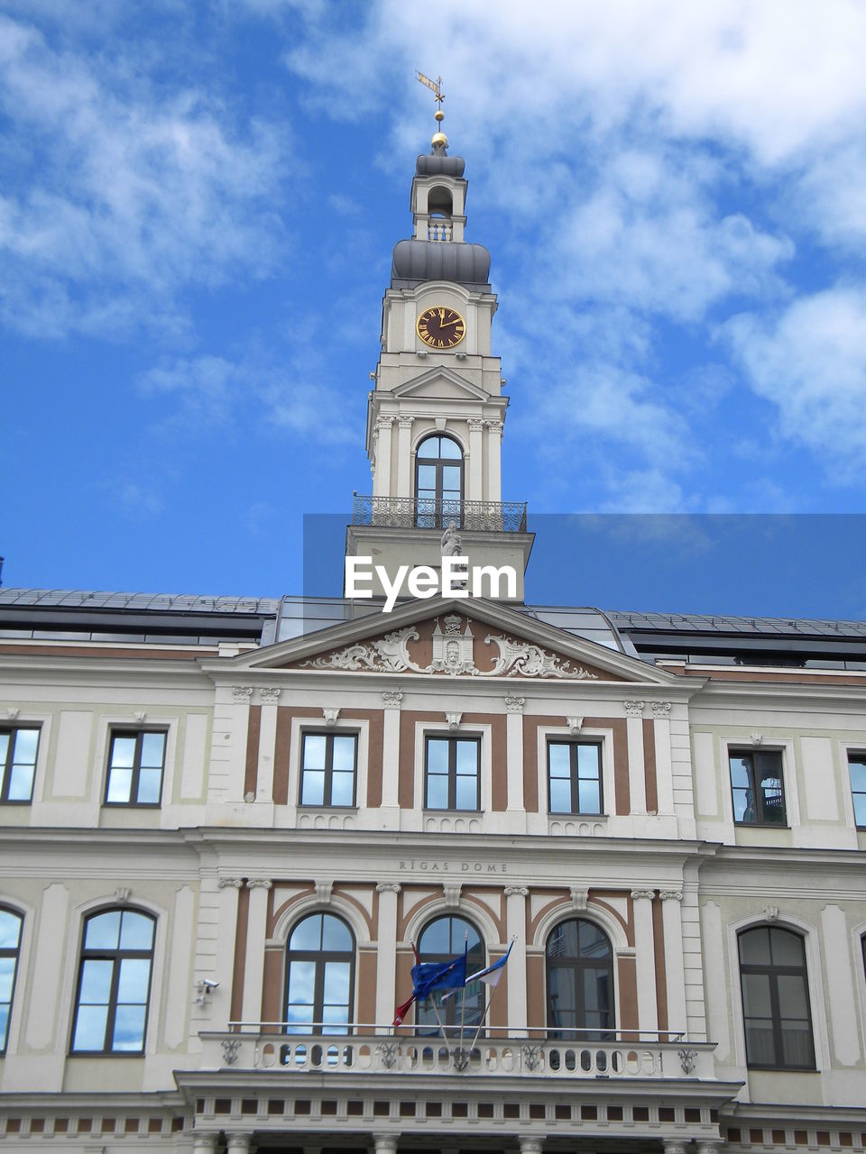 Low angle view of riga city council against sky