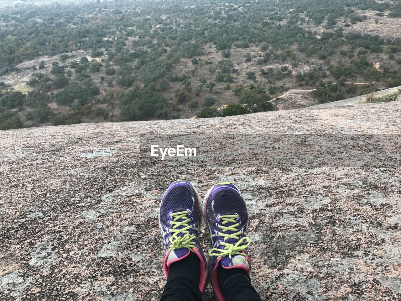 Low section of woman on rock