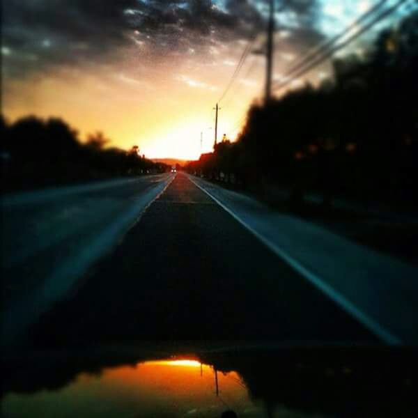 VIEW OF ROAD AT SUNSET