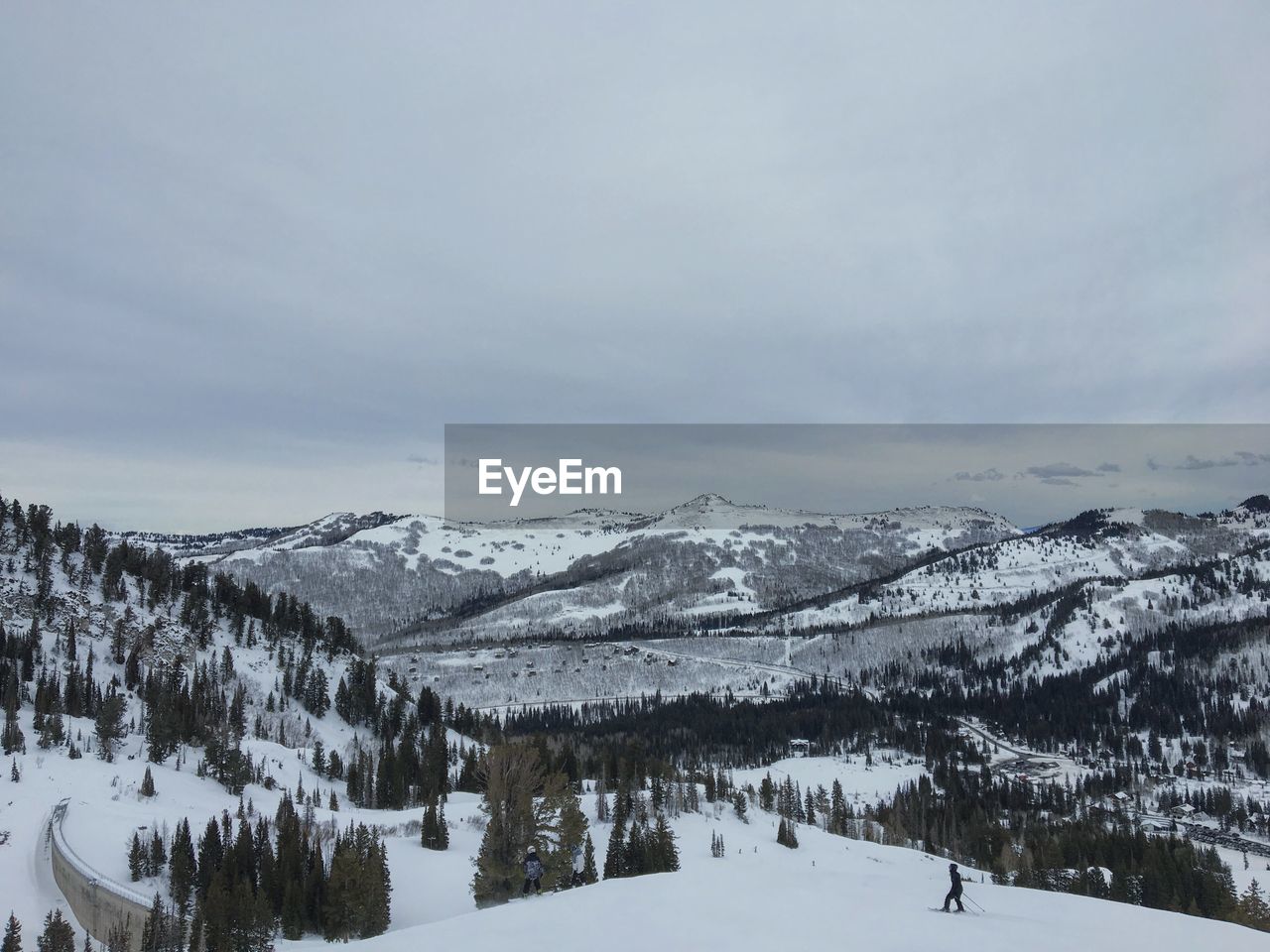 SNOW COVERED LANDSCAPE AGAINST SKY