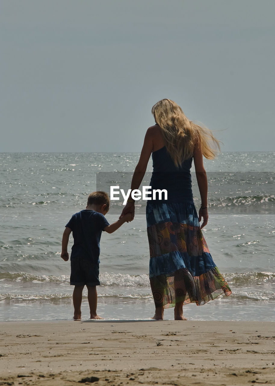 Mother and son love on the beach. love of mother