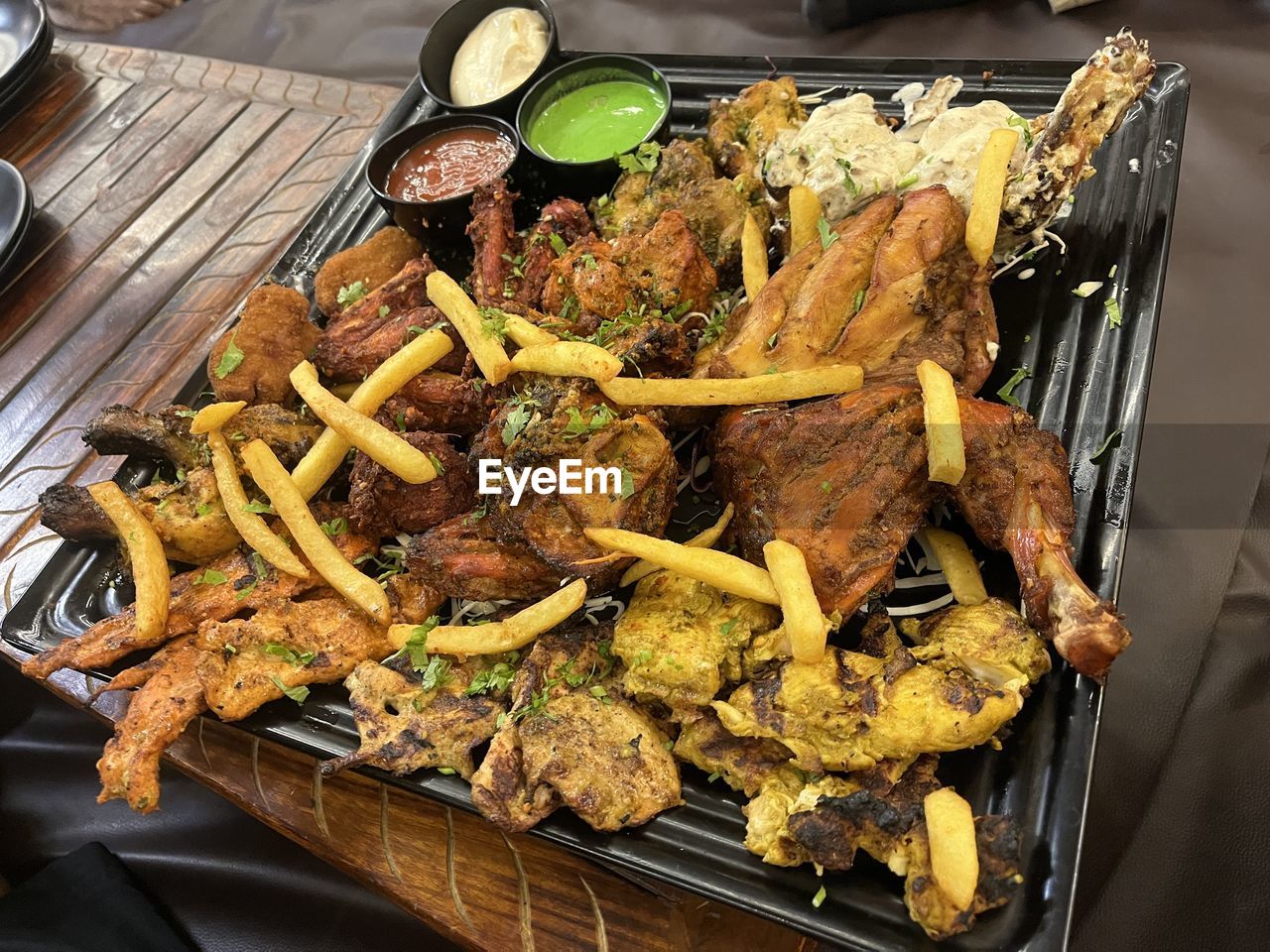 food, food and drink, freshness, dish, meal, grilling, cuisine, meat, high angle view, no people, healthy eating, fried, table, indoors, vegetable, wellbeing, still life, cooking, barbecue, snack, close-up