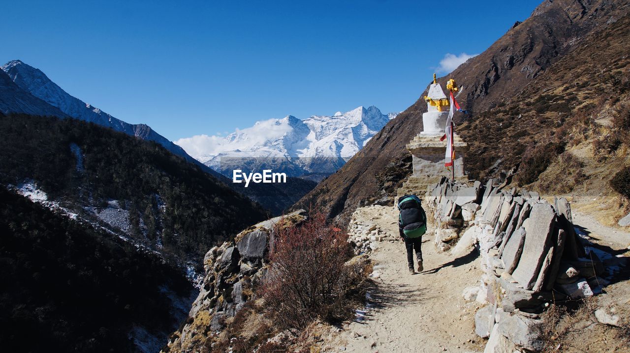 Panoramic view of snowcapped mountains against sky