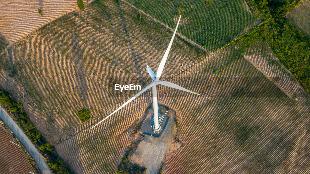 High angle view of windmill on field 