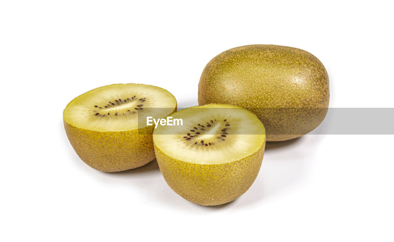 food and drink, food, healthy eating, fruit, wellbeing, freshness, cut out, produce, white background, kiwi, plant, studio shot, cross section, kiwifruit, slice, indoors, yellow, no people, citrus fruit, organic, vitamin, ripe, group of objects, raw food, juicy