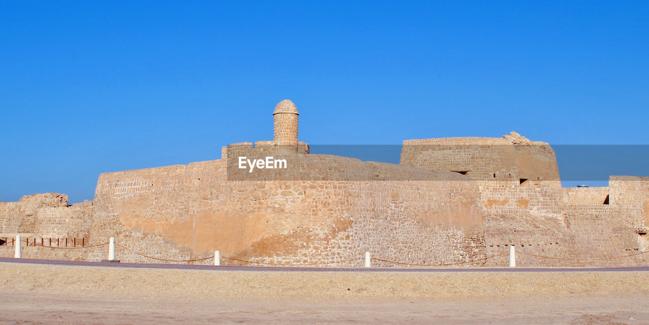 VIEW OF FORT AGAINST BLUE SKY