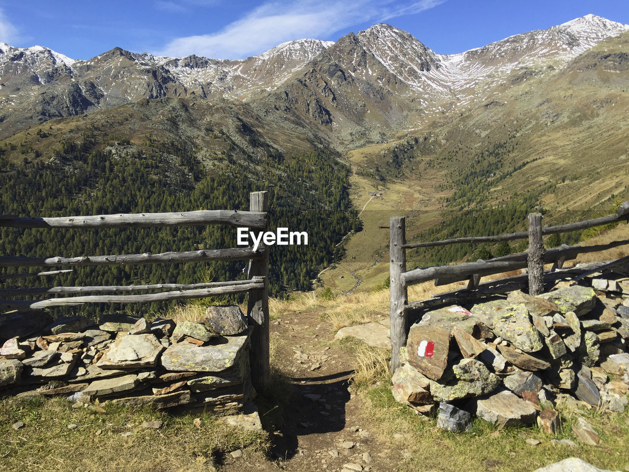 Scenic view of landscape and mountains against sky