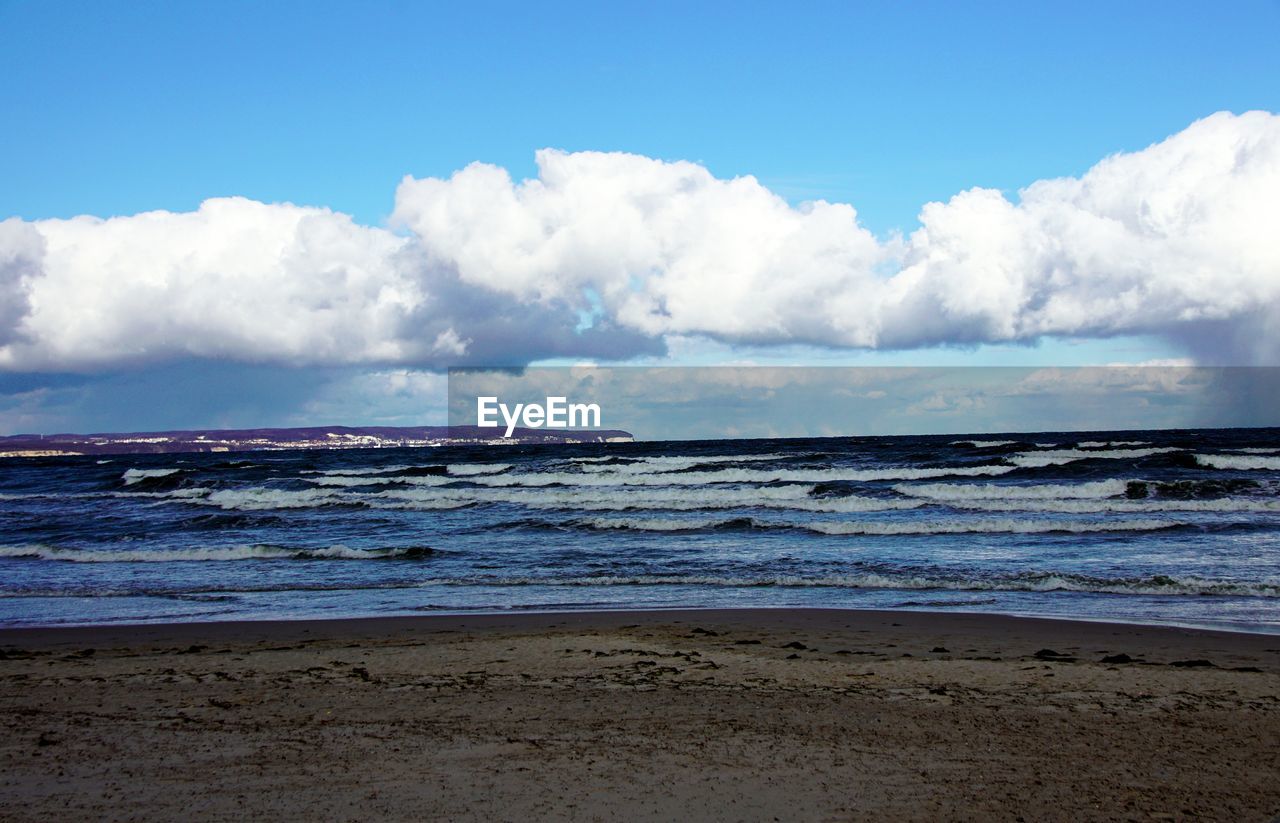 Scenic view of beach against sky