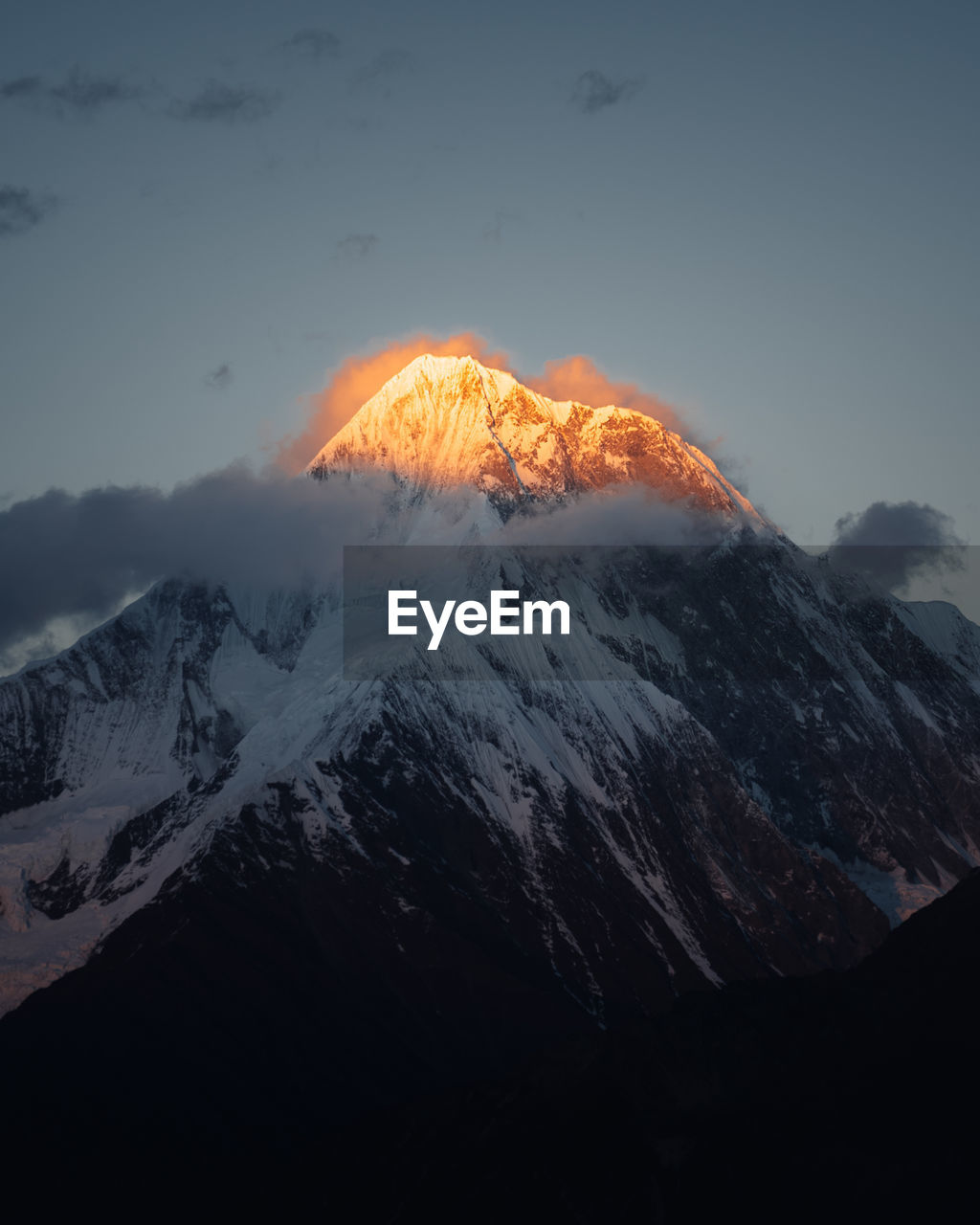 scenic view of mountains against sky during sunset