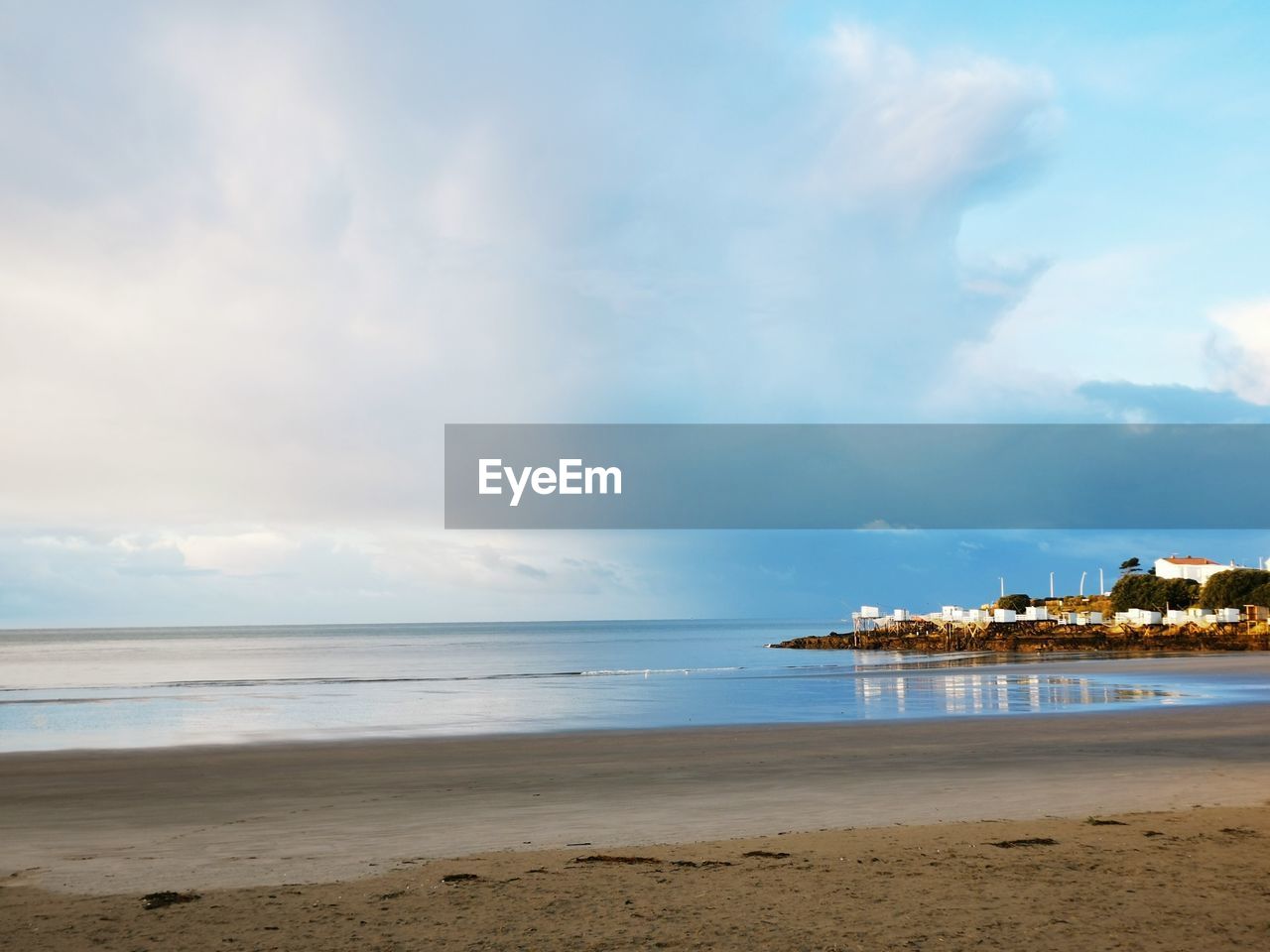VIEW OF BEACH AGAINST SKY