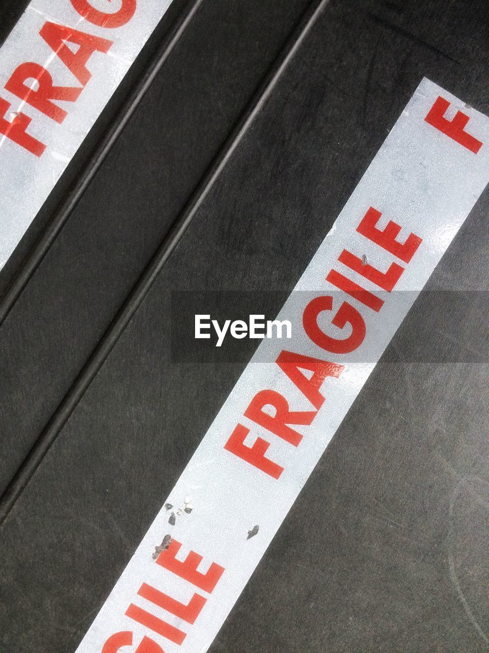 High angle view of fragile tape