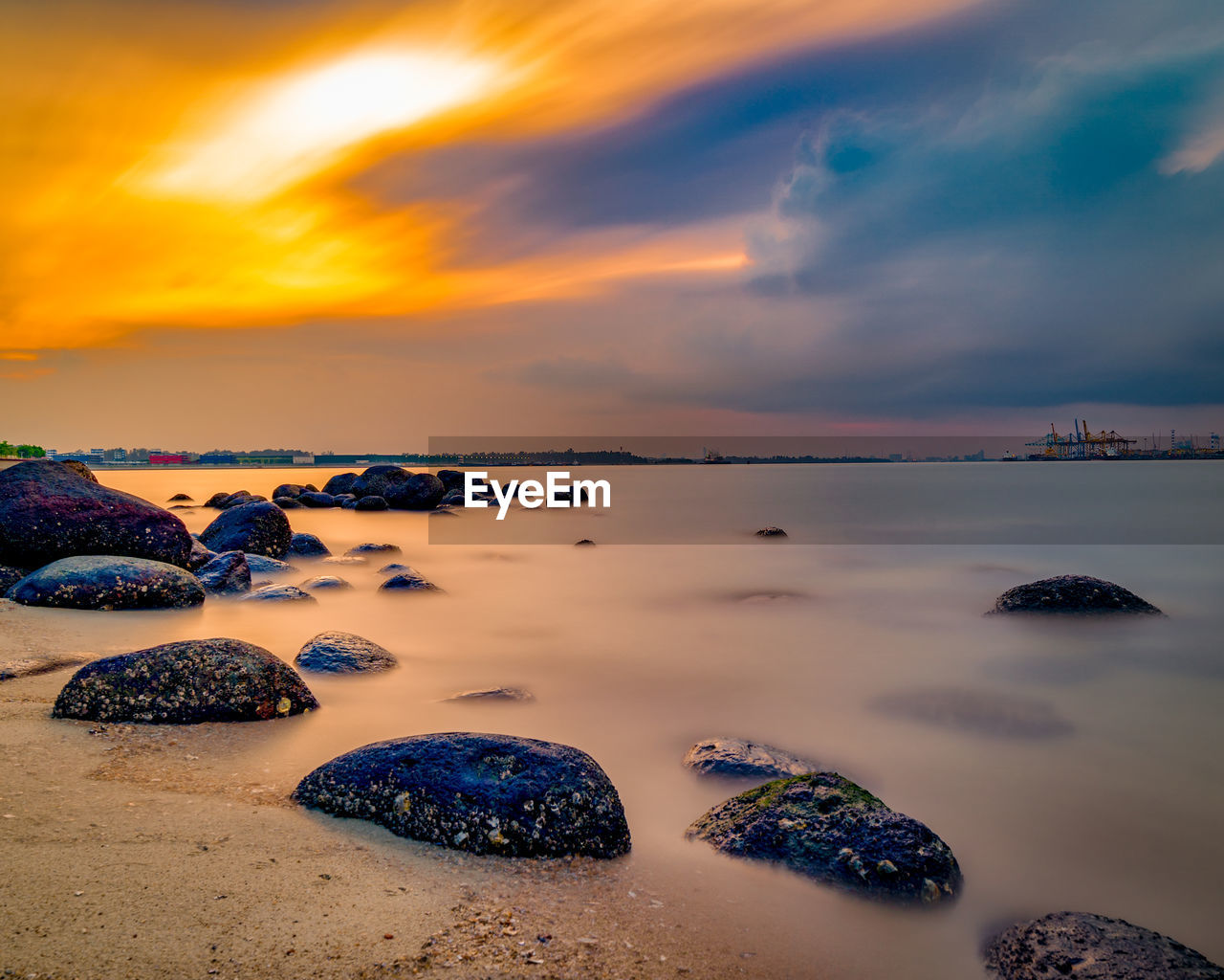 Scenic view of sea against sky during sunset