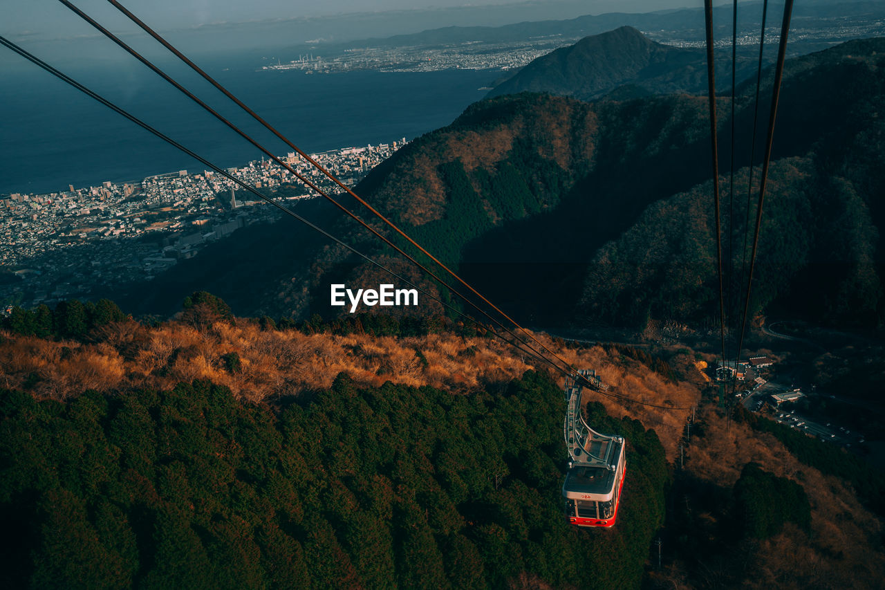 Scenic view of mountains and cable car