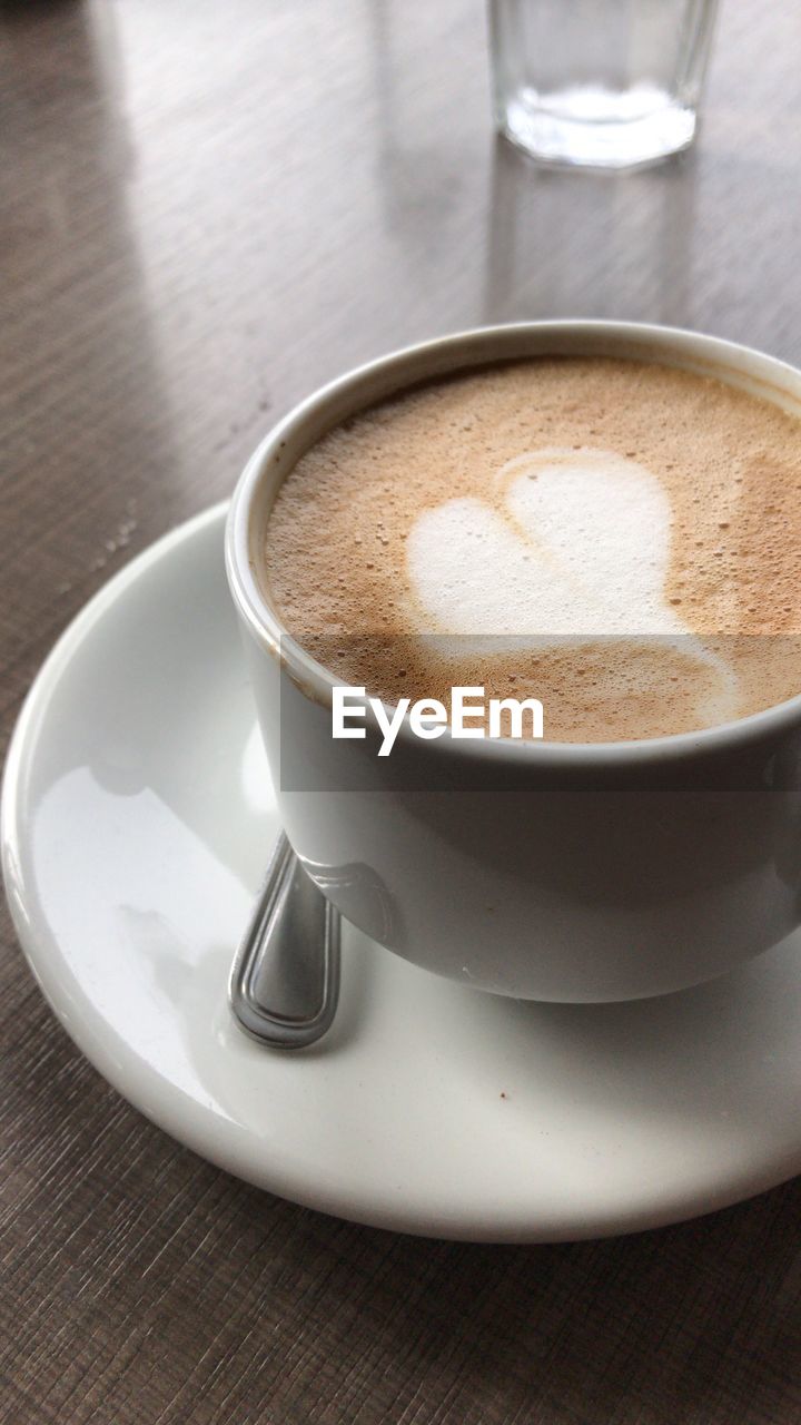 CLOSE-UP OF COFFEE ON TABLE