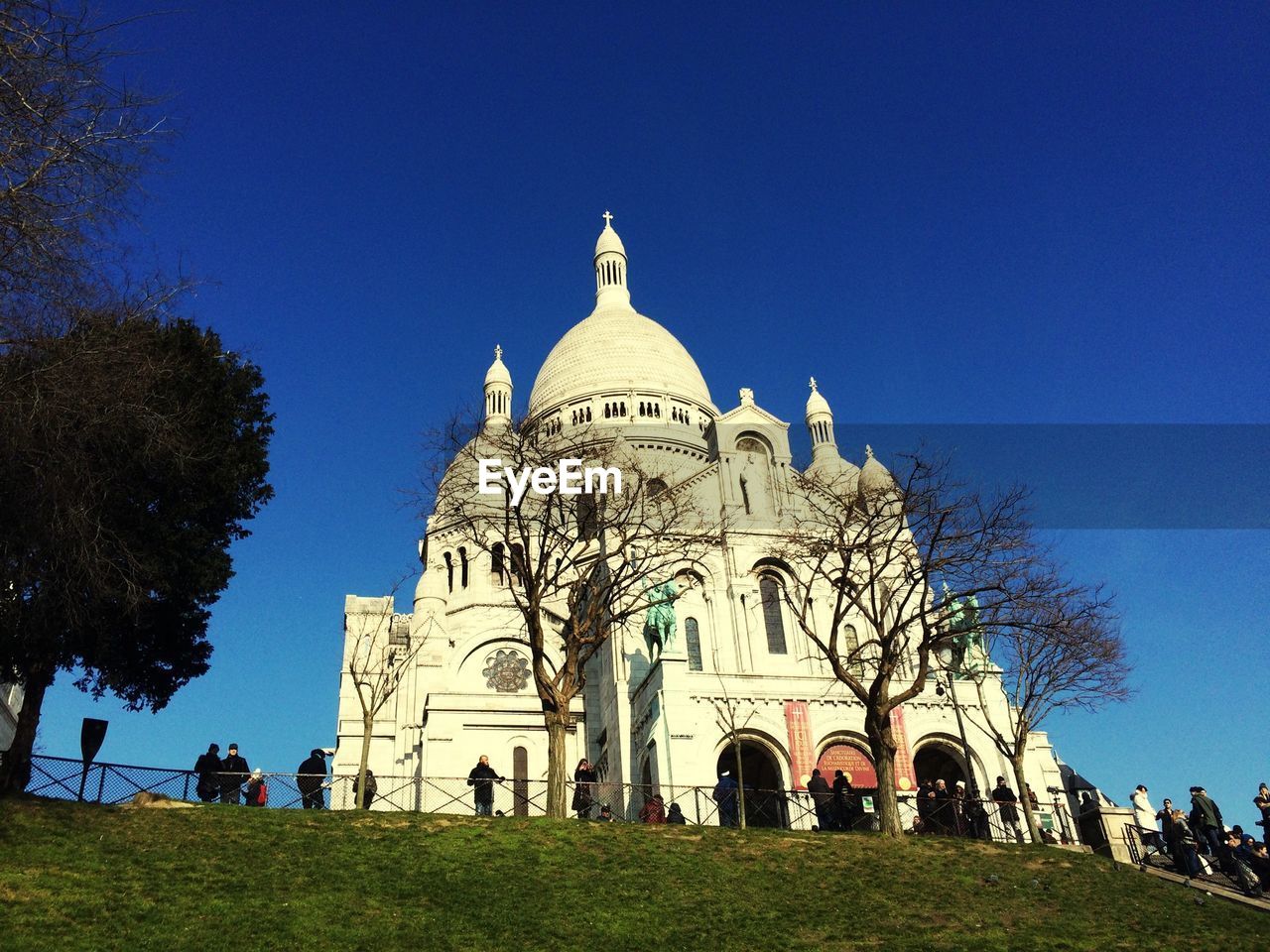 Low angle view of church against clear blue sky