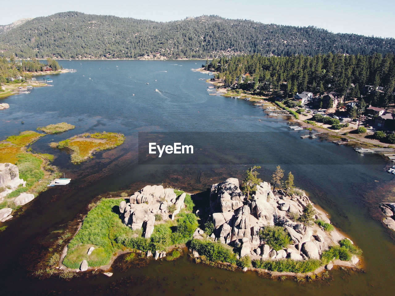 HIGH ANGLE VIEW OF RIVER AMIDST ROCKS