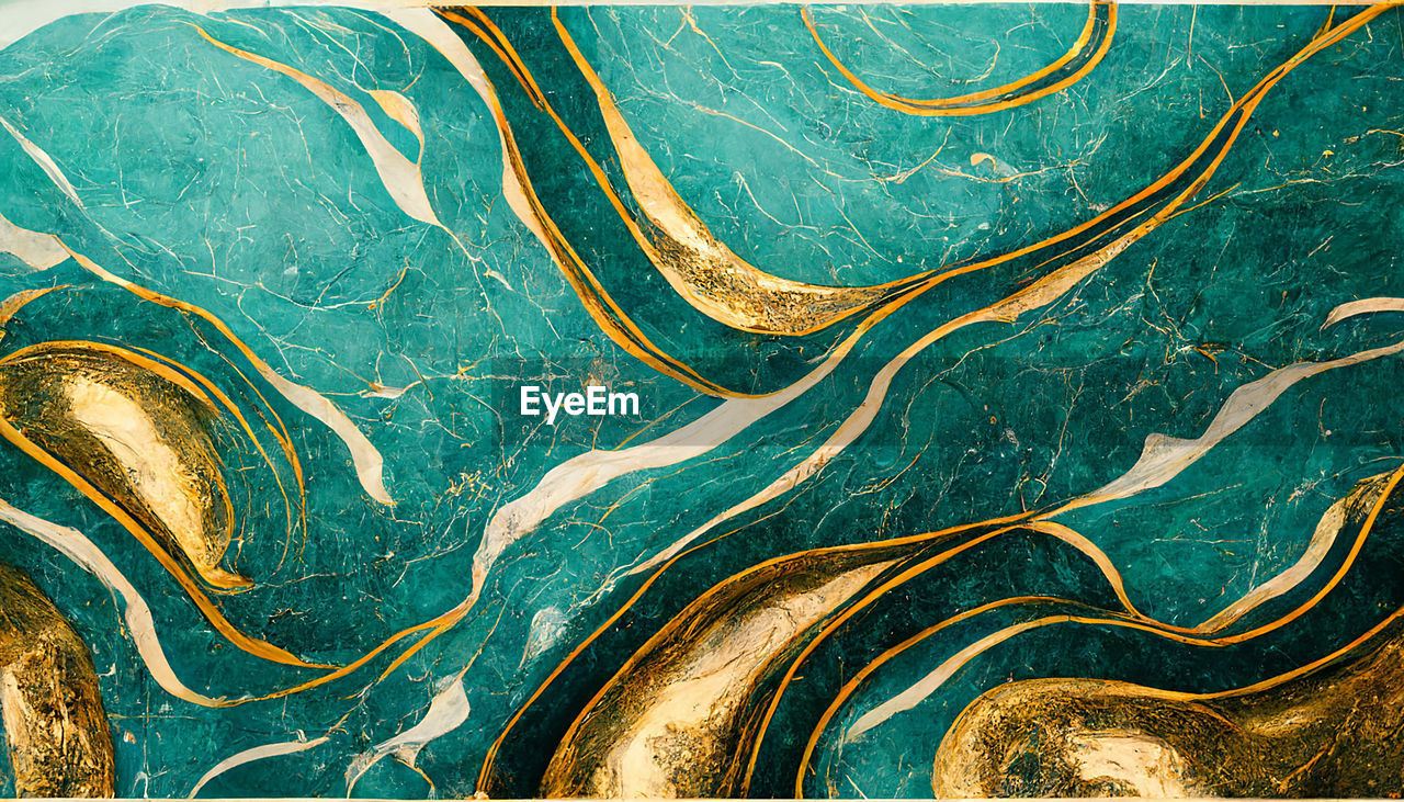 The natural pattern background in gold and teal color