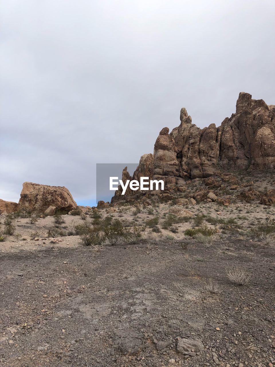 Rock formations on landscape against sky