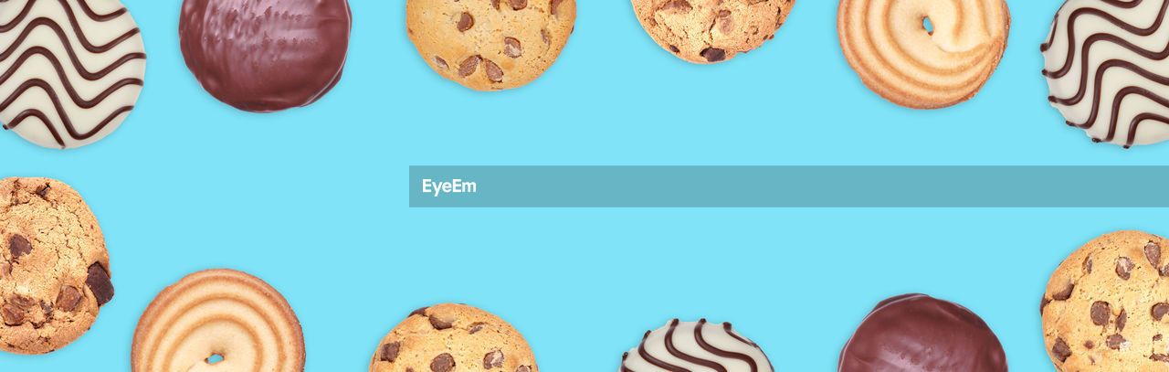High angle view of cookies against blue background