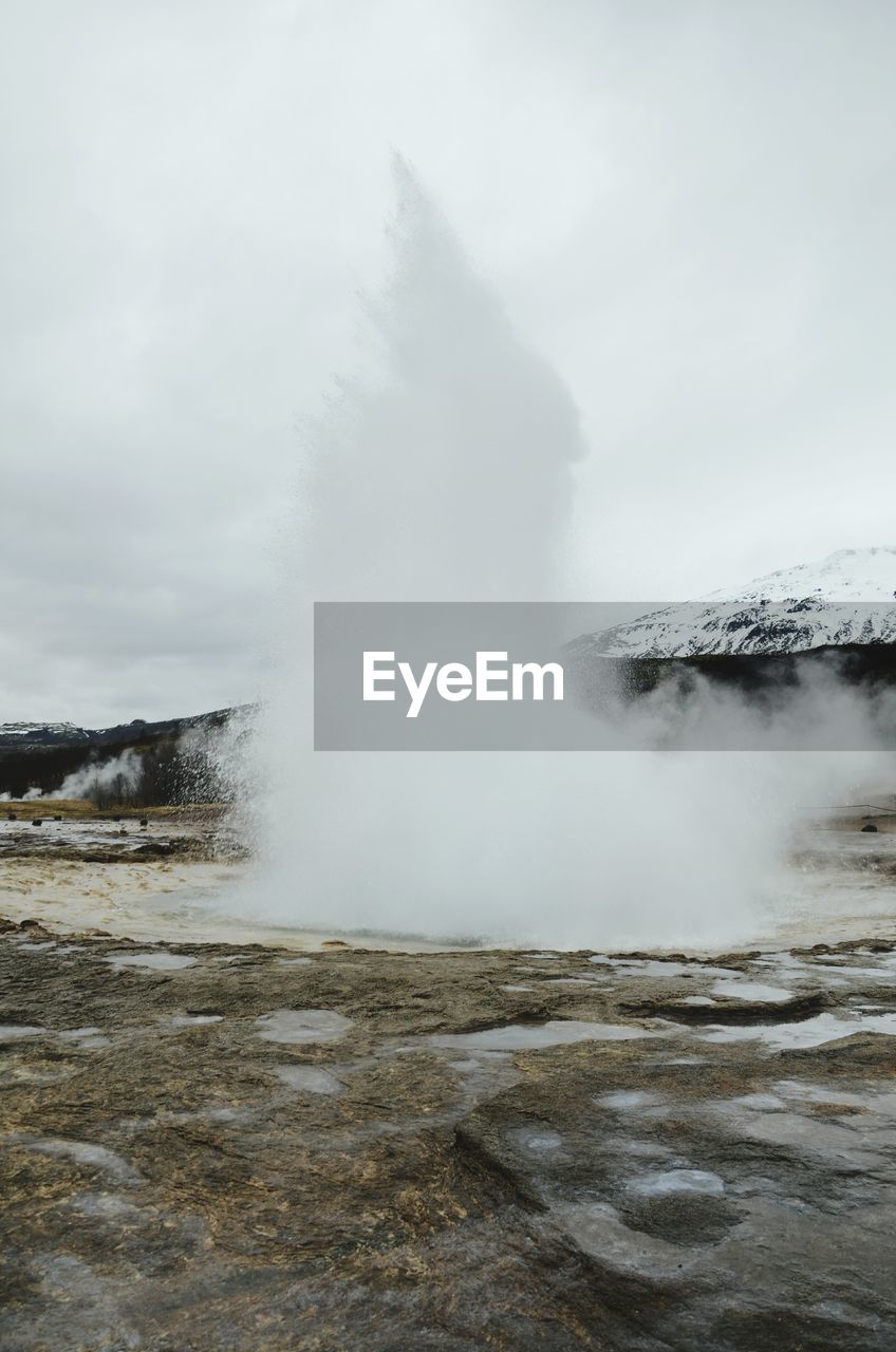 Geyser against sky