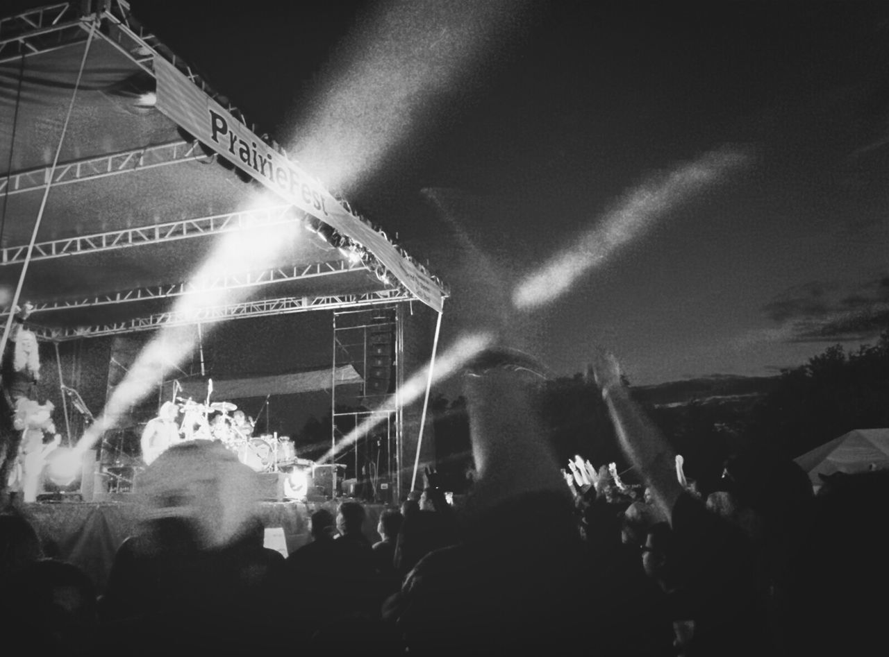 PEOPLE ENJOYING MUSIC CONCERT