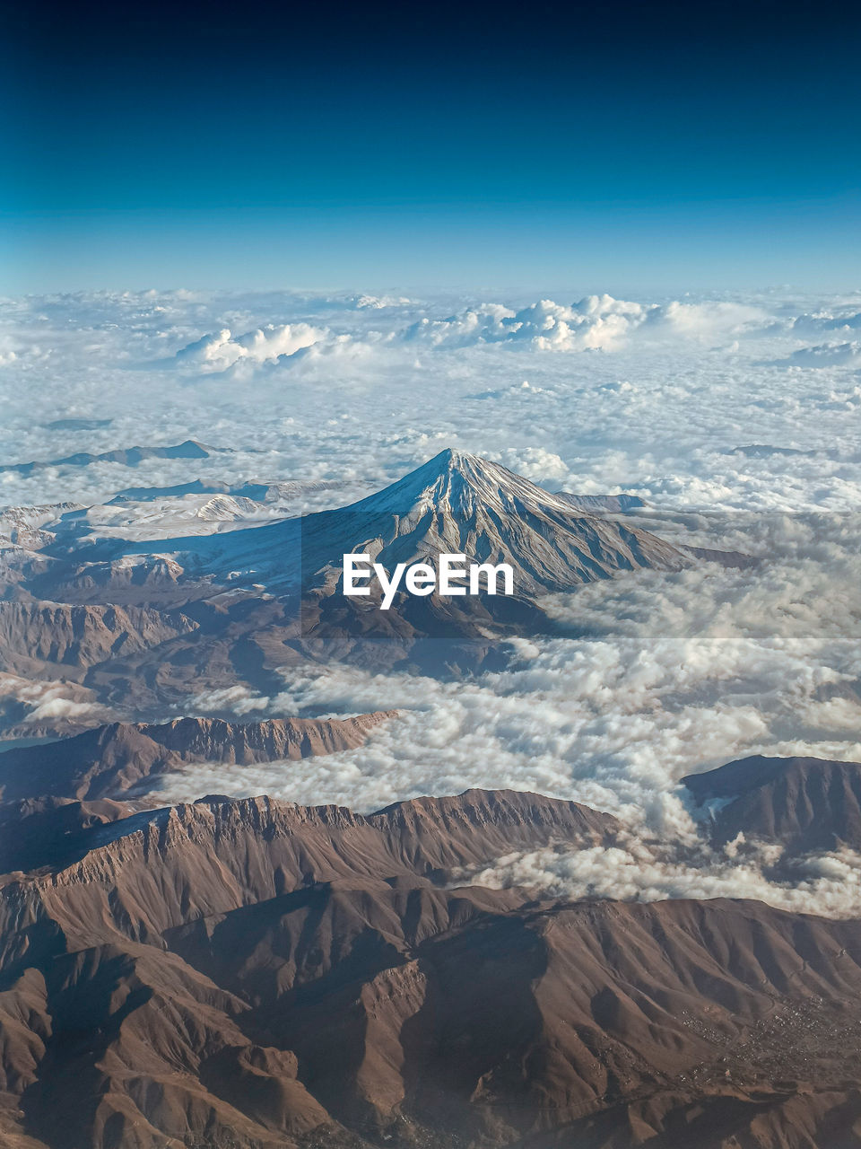 Mount damavand in iran sorrounded by clouds